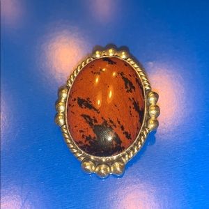 Sterling silver tiger agate pendant.